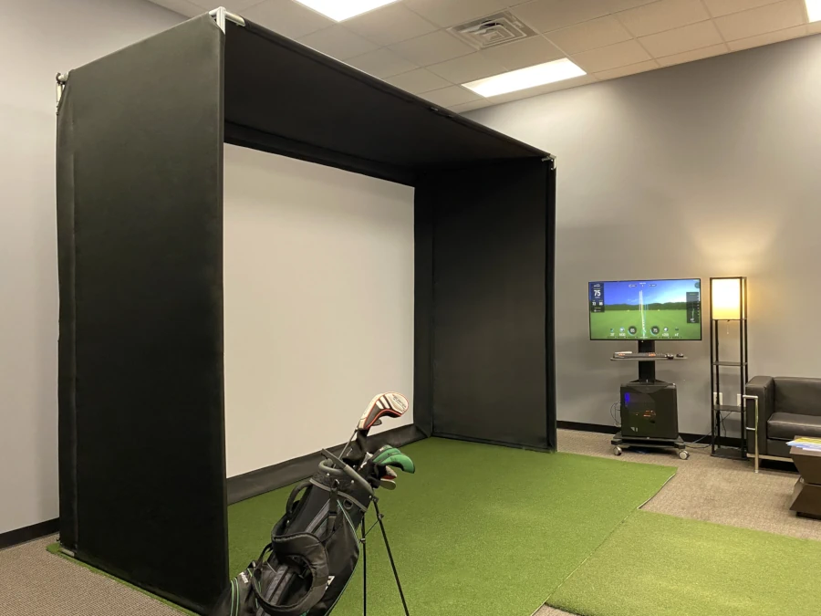 Golf simulator hitting bays and enclosures