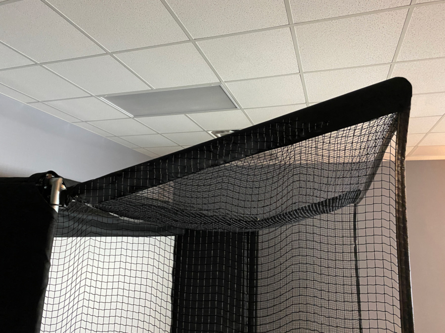 The SkyGuard™ netting protection system extends over 4' past the edge of your golf simulator bay, and can be raised to over 10' tall!